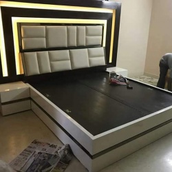 bed with padded headboard